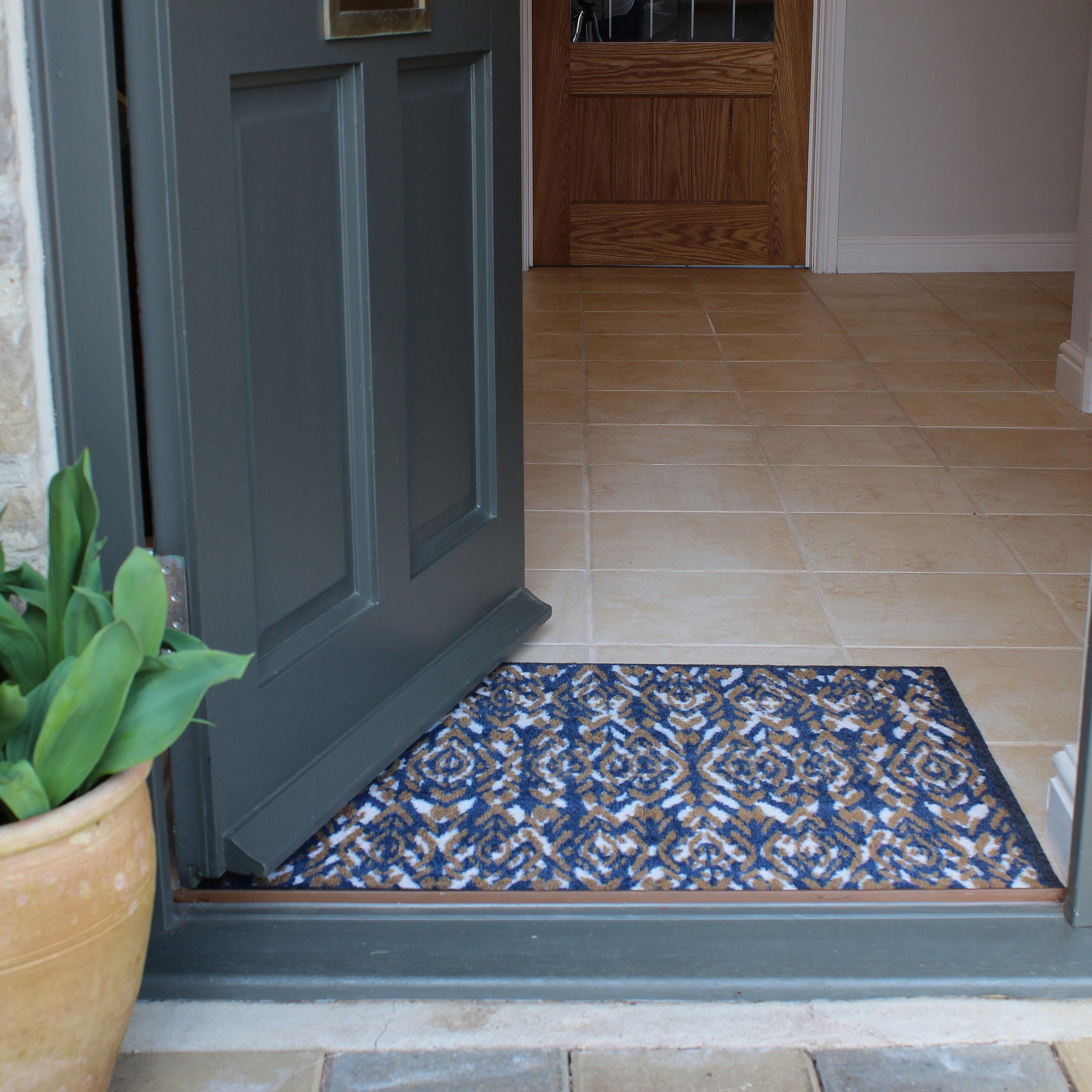 Shaded Ikat Washable Recycled Doormat In Brown Navy